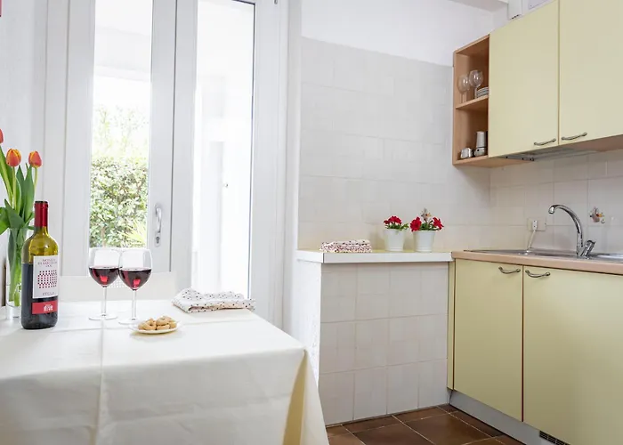 Апартаменты Olmi Марина-ди-Кампо